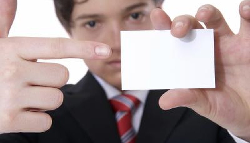 Young man with RSVP card. Young man with RSVP card.