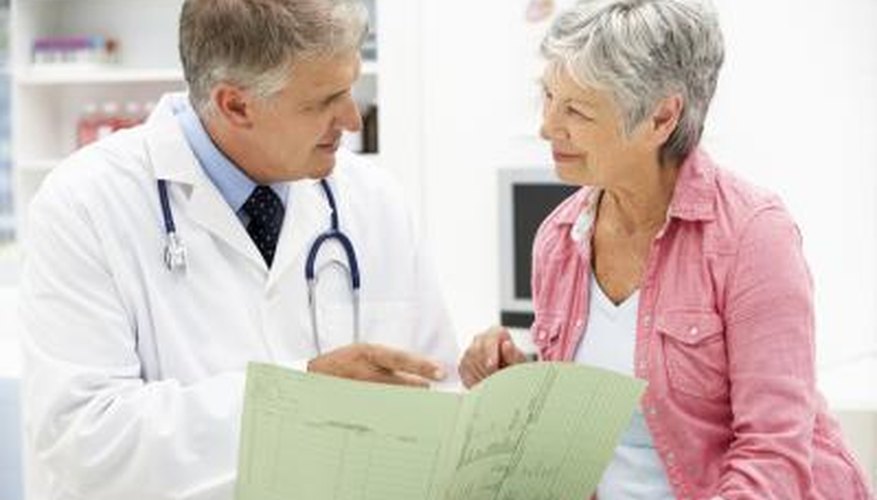 woman speaking with her doctor woman speaking with her doctor