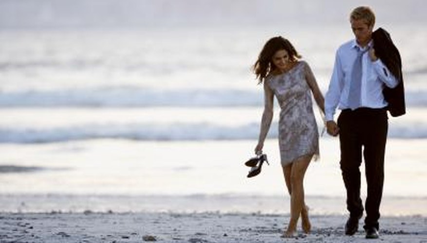 Couple walking on beach Couple walking on beach