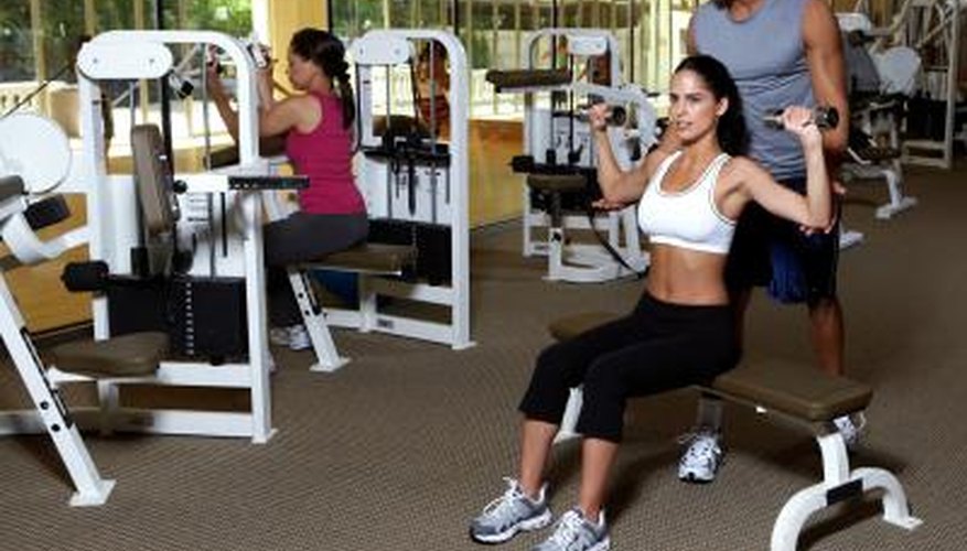 A woman is strength training. A woman is strength training.