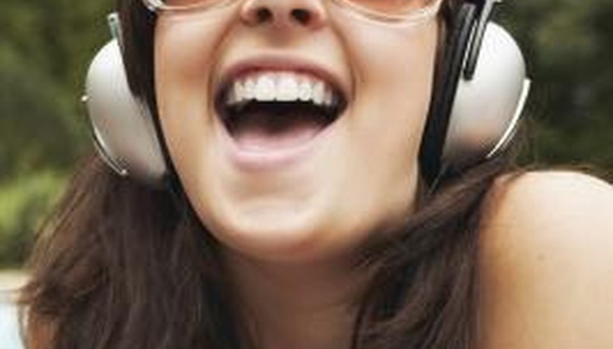 Teen girl listening to music Teen girl listening to music