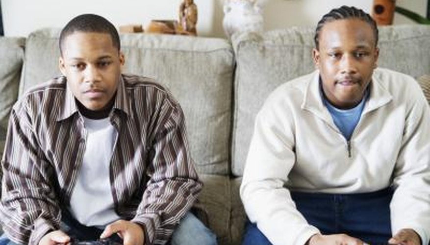 Two men playing video games Two men playing video games