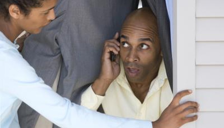 man hiding from woman in closet man hiding from woman in closet