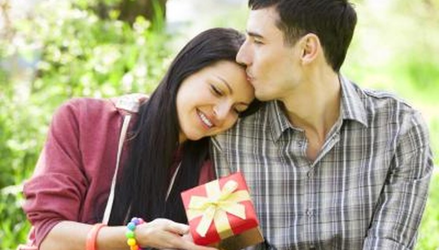 boy giving girl a gift boy giving girl a gift