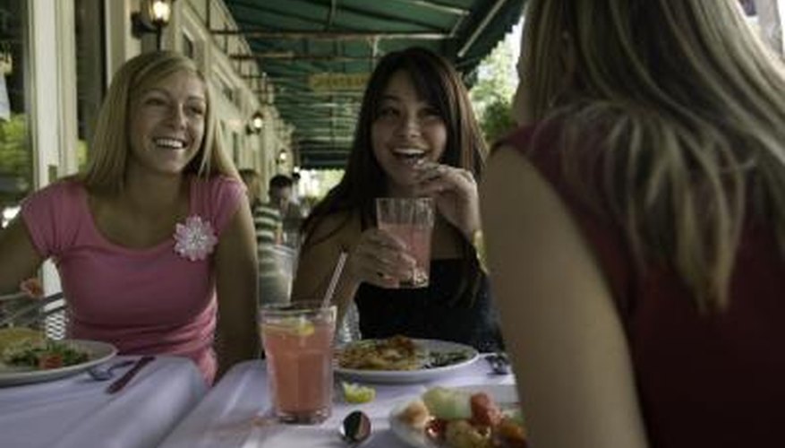 Friends laughing at lunch Friends laughing at lunch