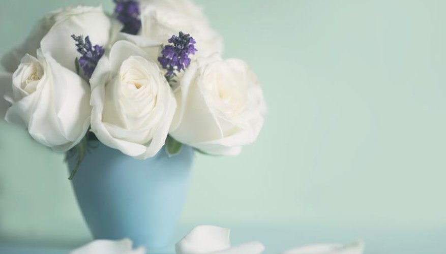 Softly scented roses pair with lavender sprigs for a calming bedside bouquet. Softly scented roses pair with lavender sprigs for a calming bedside bouquet.