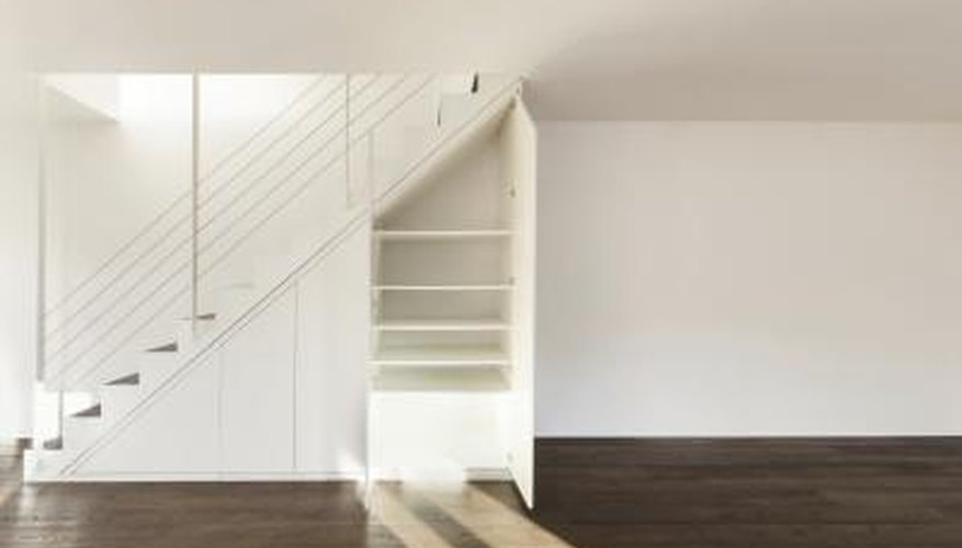A storage space underneath a set of stairs. A storage space underneath a set of stairs.