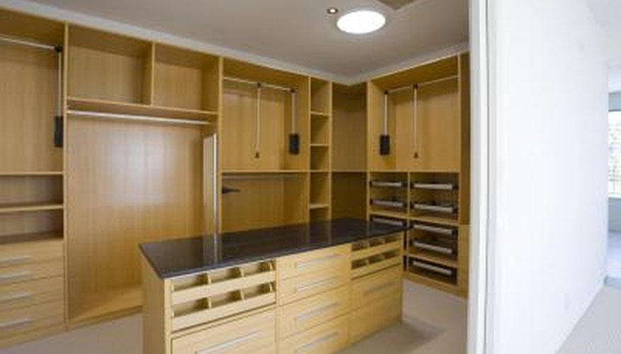 A large empty walk in closet. A large empty walk in closet.