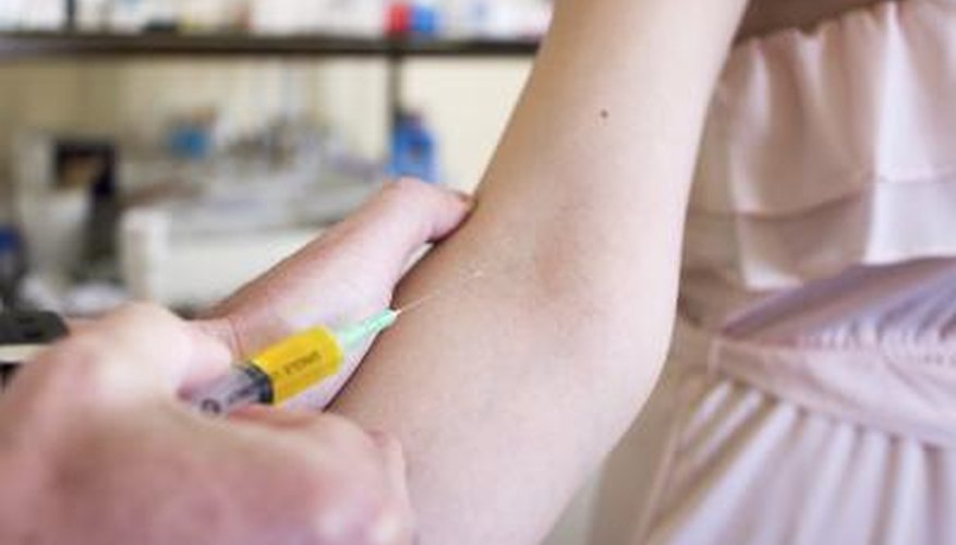 woman receiving injection woman receiving injection