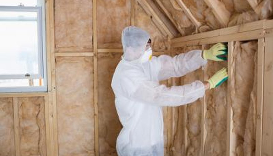 Man installing insulation Man installing insulation