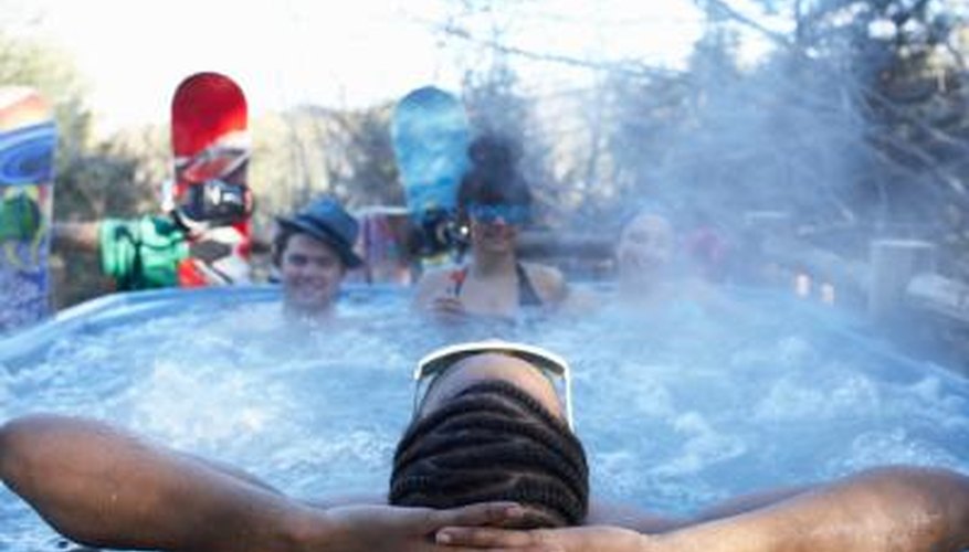 Young people enjoying the hot tub Young people enjoying the hot tub