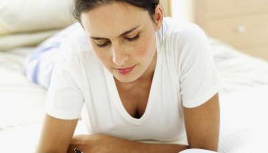 Woman writing in notebook Woman writing in notebook