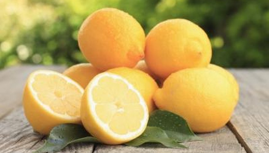 Fresh lemons on a garden table