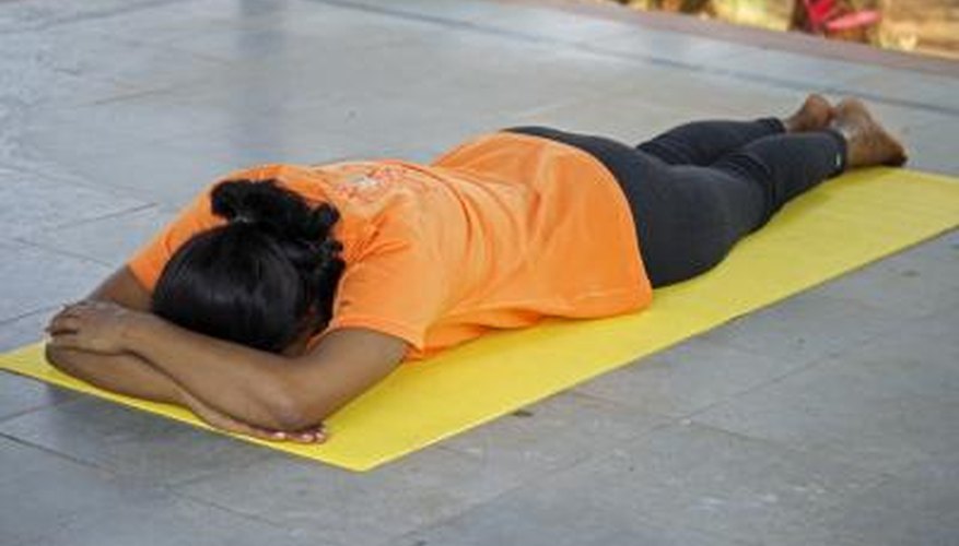 Start by laying on your stomach Start by laying on your stomach