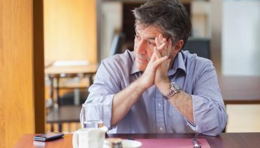 Man waits at coffee shop Man waits at coffee shop