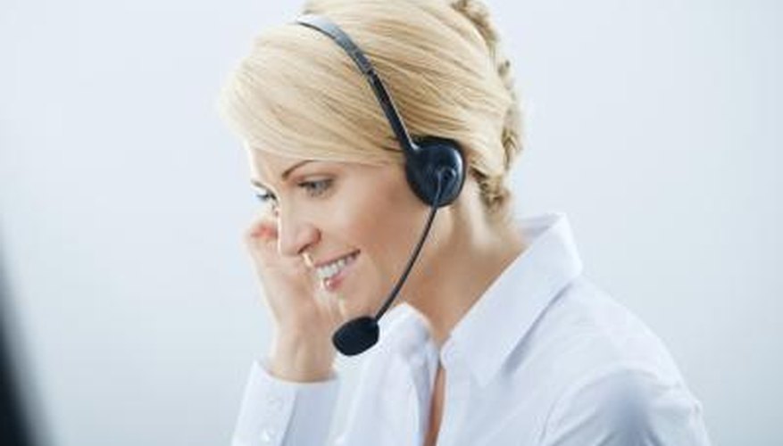 Some customer service representatives speak on a headset.
