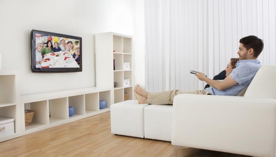 Couple relaxing on sofa Couple relaxing on sofa