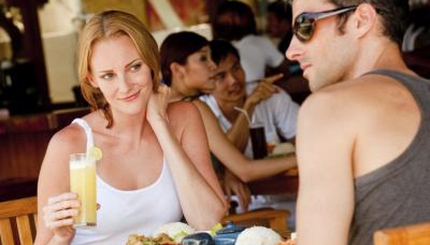Couple dining together at a jazz cafe. Couple dining together at a jazz cafe.
