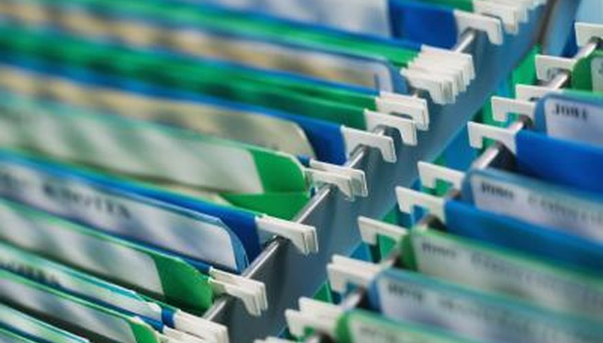 Hanging file frames keep you organized in a small home office. Hanging file frames keep you organized in a small home office.