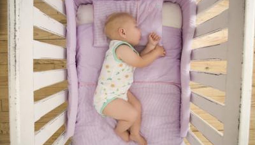 Aerial view of baby in a crib. Aerial view of baby in a crib.