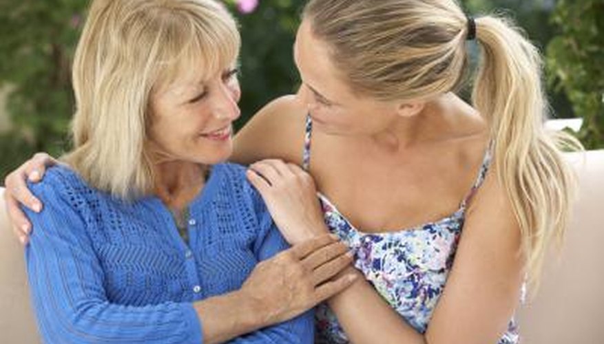 woman talking to elderly woman woman talking to elderly woman