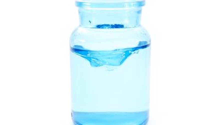 Blue jar with water mixture. Blue jar with water mixture.