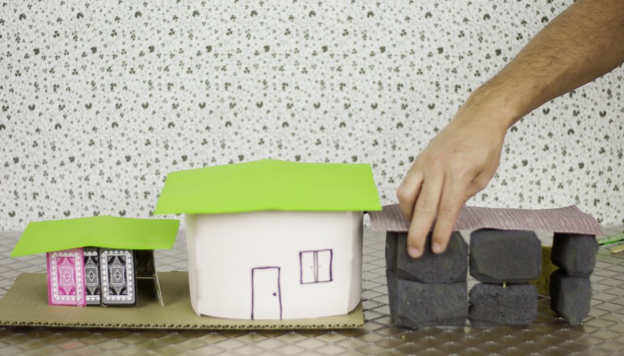 He makes projects. Earthquake model House. Earthquake model.