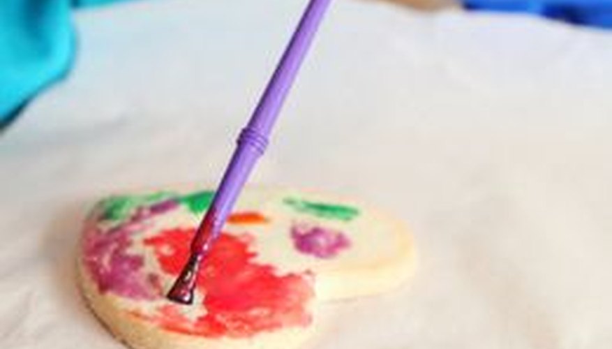 Apply the edible paint to plain sugar cookies for a colorful sweet treat. Apply the edible paint to plain sugar cookies for a colorful sweet treat.