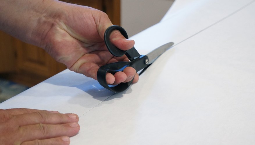 Cut the film to size. Cut the film to size.
